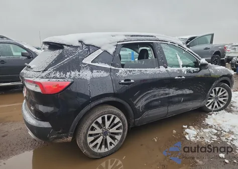 2021 Ford Escape Titanium from USA, damaged, VIN 1FMCU0DZ7MUA37521